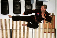 Master O'Connor demonstrates a flying side kick.